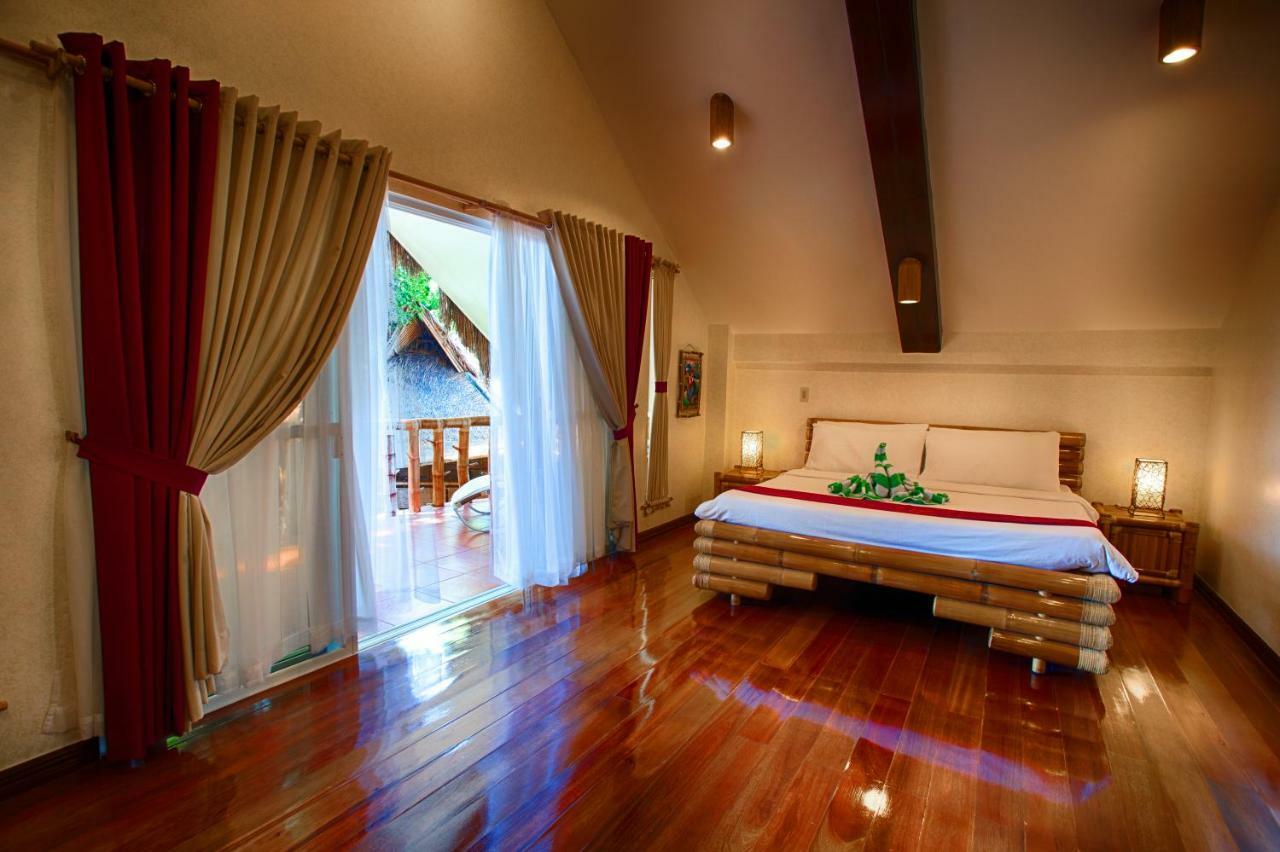 Pura Vida Beach & Dive Resort Dauin Exterior foto